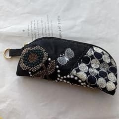 ミナペルホネン　ハンドメイド　ラウンドポーチのサムネイル