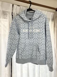COACHコーチレディース水色パーカー サイズS - メルカリ