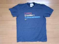 未使用品FCバルセロナ2008-09 スペイン史上初3冠達成記念TシャツL