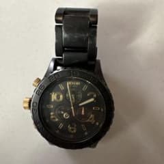 NIXON 腕時計 ブラック×ゴールド ジャンク品のサムネイル