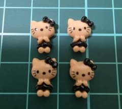 ネイルパーツ 日焼けキティ4個セットのサムネイル