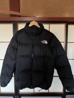 THE NORTH FACE ブラック ヌプシダウンジャケットのサムネイル