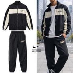 Nike ナイロン上下セットアップ黒/アイボリー 新品未使用メンズ　レディースのサムネイル