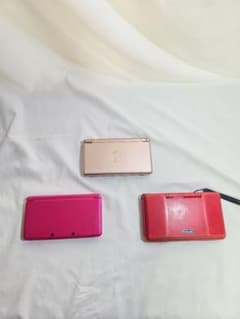 Nintendo 3DS and DS consoles, bundle of 3, for sale. Includes Animal Crossing.