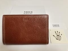 タケオキクチ レザー セミ長財布 ターナリ 734605 定価19800円 - メルカリ