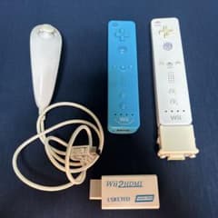 Nintendo Wii Remote (2 pieces), Nunchuk, and Wii HDMI Adapter