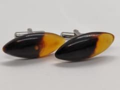 Genuine tortoiseshell cufflinks for men's suits and accessories.