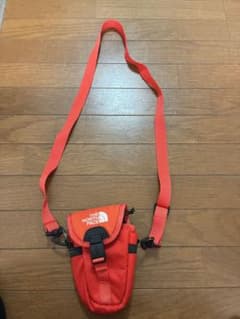 THE NORTH FACE ショルダーバッグ オレンジのサムネイル