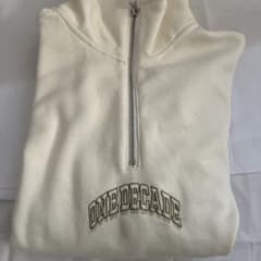 H&M ONE DECADE ハーフジップ トレーナー クリーム色のサムネイル