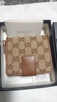 GUCCI  二つ折り財布  GGキャンバス  ベージュのサムネイル