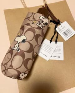 新品 【COACH X PEANUTS】UV ミニ アンブレラ スヌーピー - メルカリ