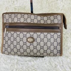 GUCCI アクセサリーポーチ　GGスプリーム　グレー　クラッチバッグ　PVCのサムネイル