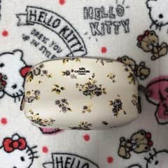 COACH 花柄ポーチ ホワイトのサムネイル