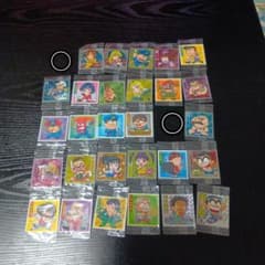 65 stickers featuring characters from Kochikame, One Piece, Spy Family, and Hunter x Hunter.