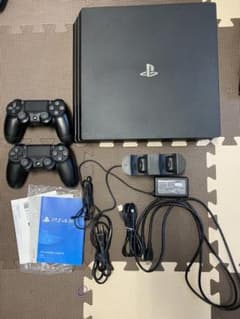 PS4 pro 1TBジェットブラック(コントローラー×2.充電器.ソフト付き)のサムネイル