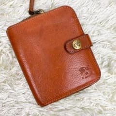 美品 イルビゾンテ 折り財布 二つ折り ヌメ革 ブラウン ロゴ型押しのサムネイル