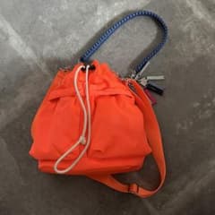 cheek 巾着型ショルダーバッグ オレンジのサムネイル