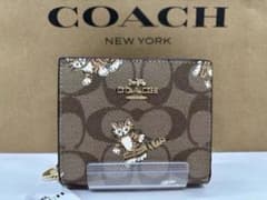 [新品未使用]COACH コーチ　猫　ダンシングキトゥン　二つ折り財布 新品未使用]COACH コーチ 猫 ダンシングキトゥン 二つ折り財布 - メルカリ