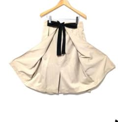 Unused ZARA beige flared skirt with waist ribbon.