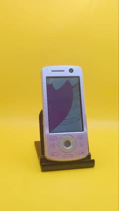 Excellent condition, cute Docomo D903i flip phone in spring pink.