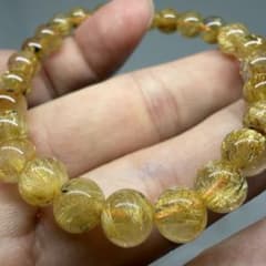 157 ハイクオリティ 7-7.5mmゴールド タイチン ルチル クォーツ