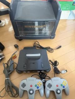 Nintendo 64 本体 コントローラー2個 収納ラック付きカセット付きのサムネイル