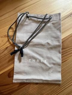 【新品未使用】THREE キャンバス地 巾着バッグのサムネイル