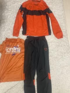 【未使用Nike Dri-FIT ピステ上下 セットMサイズ　オレンジ/ブラックのサムネイル