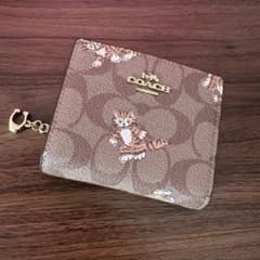 コーチ COACH シグネチャー ダンシングキトゥン 猫が愛らしい二つ折り
