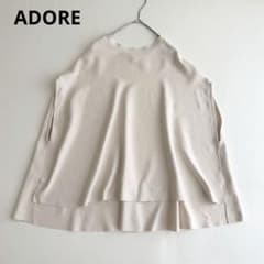 ADORE アドーア ドライストレッチ フレアポンチョ エクリュ 38 ADORE アドーア ドライストレッチ フレアポンチョ エクリュ 38 - メルカリ