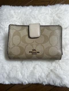 COACH 二つ折り財布 シグネチャー ベージュのサムネイル