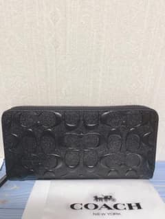 新品未使用〕COACH エンボス加工 ブラック 長財布 - メルカリ