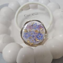ハンドメイド ゴールドリング型 忘れな草 レジンヘアゴム - メルカリ