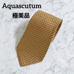 【極美品】Aquascutum ネクタイ ゴールド ジオメトリック 小紋柄のサムネイル