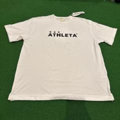 ATHLETA ホワイト Tシャツ Jogar uma Peladaのサムネイル