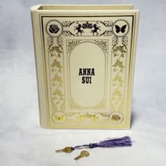 Anna Sui jewelry box, key-shaped, book-style accessory case.