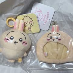 A cute, mascot-sized plush cap featuring a round, fluffy rabbit mascot.