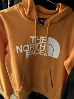 THE NORTH FACE オレンジ パーカー Mのサムネイル