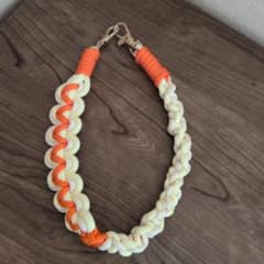 ハンドメイド スマホショルダーストラップ 編み込み オレンジ×イエローのサムネイル