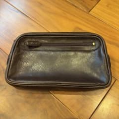 Gucci dark brown leather clutch bag