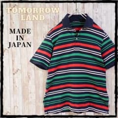 Relatively good condition Tomorrowland polo shirt, striped pattern, made in Japan, 100% cotton.