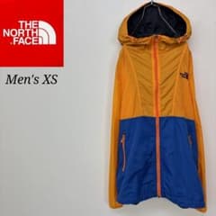 ノースフェイス ウインドブレーカー オレンジ×ブルー メンズXS 
