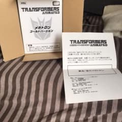 未開封 当選品 TFアニメイテッド 金のメガトロン ゴールドのサムネイル