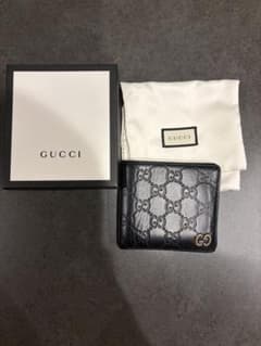 GUCCI グッチ 二つ折り財布 シマ ドリアン レザー ブラック - メルカリ
