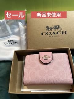 COACH 二つ折り財布 ピンク - メルカリ