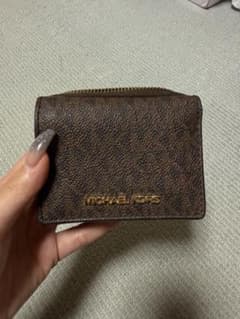 MICHAEL KORS 二つ折り財布 ブラウン ロゴ総柄のサムネイル