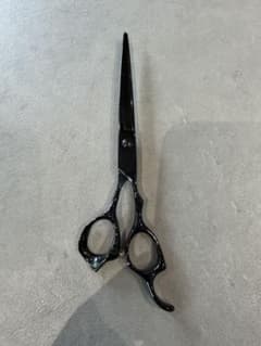 Black hair cutting scissors