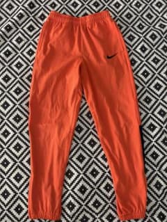 NIKE キッズ ロングパンツ オレンジ スポーツ　ナイキ　ジャージ　150cm