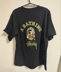 A BATHING APE ・STUSSYカモフラージュTシャツのサムネイル