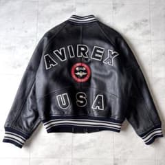【名品図鑑】アヴィレックス アーチロゴ オールレザースタジャン ブラック 中綿 名品図鑑】アヴィレックス アーチロゴ オールレザースタジャン